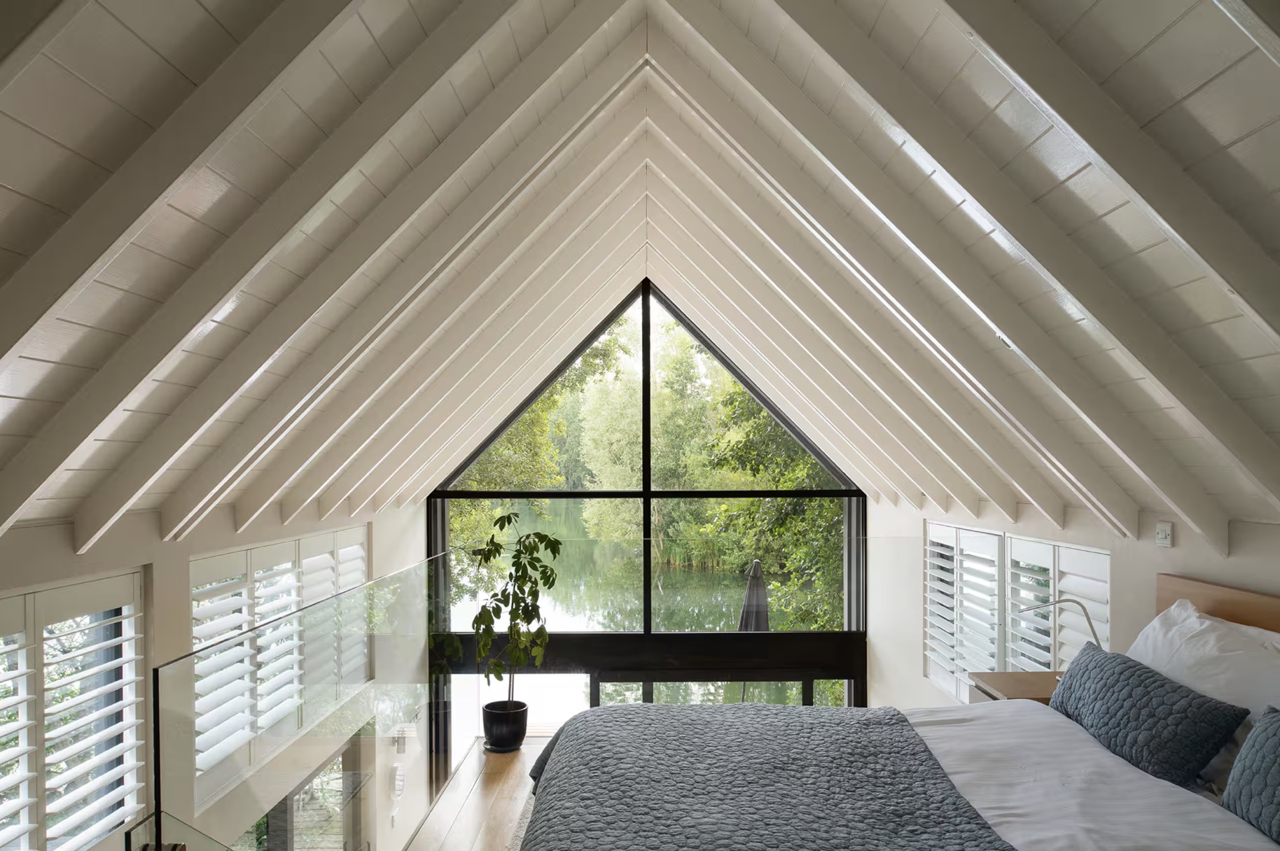 Bedroom with vaulted ceiling