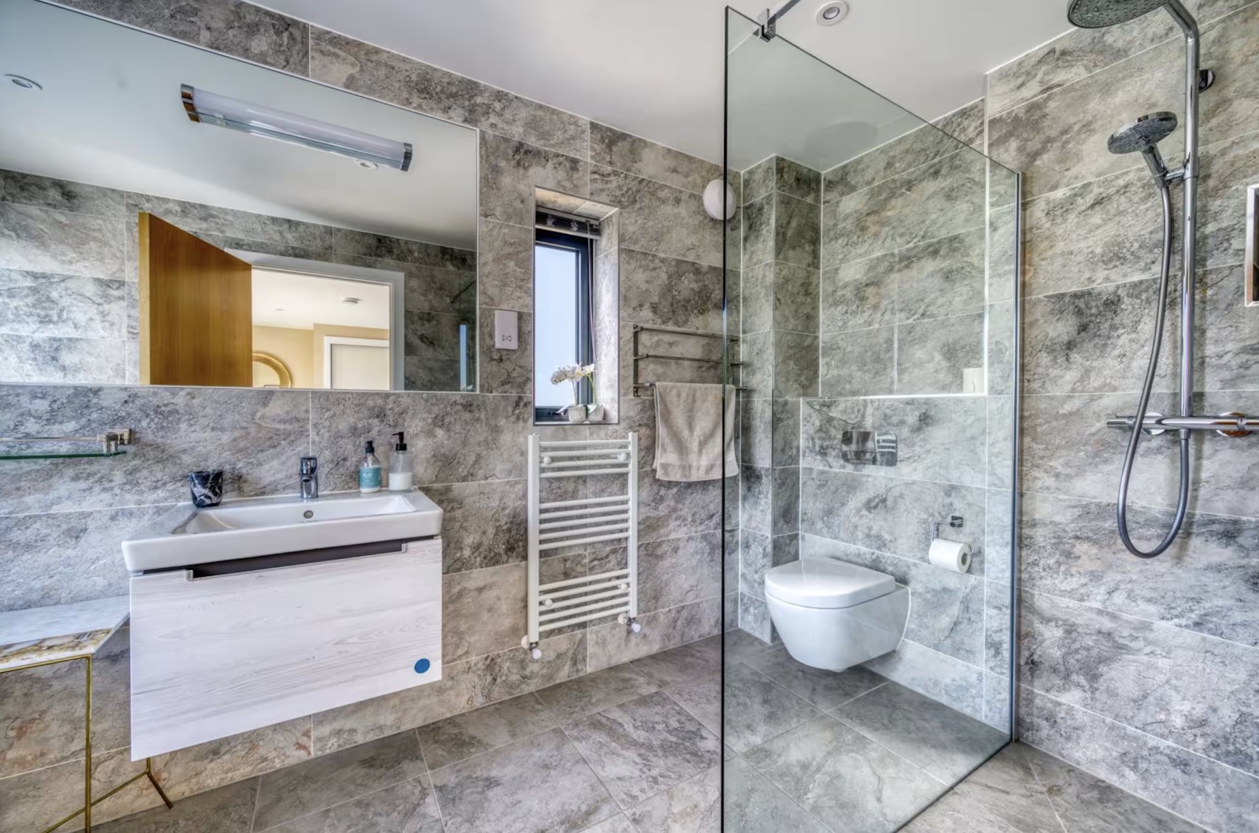 Bathroom with marble surfaces